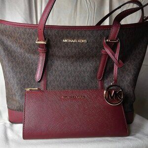 Brand new Michael Kors Tote and matching wallet.